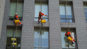 Window cleaning crew working on high-rise building in downtown Chicago