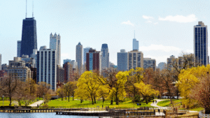 Lincoln Park neighborhood with city skyline and green trees in spring