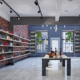 Clean boutique retail store with bright floors, shelves, and displays