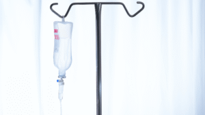 Sterilized IV stand as part of detailed medical cleaning.