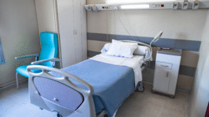 Thoroughly cleaned hospital patient room with fresh linens.
