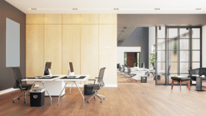 Minimalist modern office with clean wood floors and computer desks