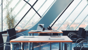 Contemporary office space with glass walls and city view