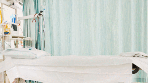  Clean and organized ICU patient room with medical equipment