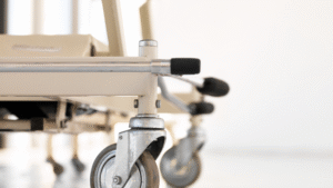 Close-up of hospital bed wheel on clean floor