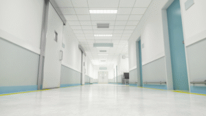 Bright, sterile hallway in a modern medical facility