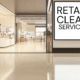 Sign reading “Retail Cleaning Services” displayed outside a modern, clean retail space.