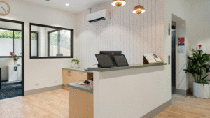 Modern reception desk in a clean and organized office environment.