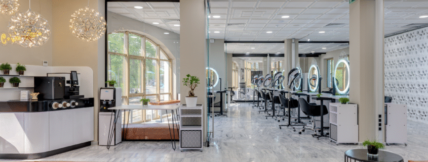 Stylish salon interior with clean stations and bright lighting.
