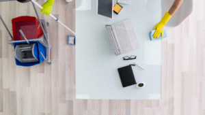 The Best Office Cleaning Services Chicago team cleaning desks and floors.