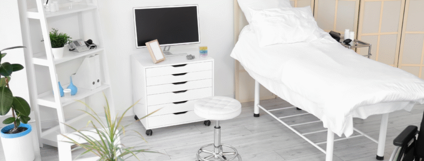 Neat and disinfected patient room in a healthcare facility.
