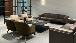 Modern office waiting area with clean furniture and tidy layout.