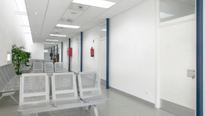 Clean and bright hospital waiting area with organized seating.