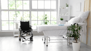 Tidy private hospital room with clean bedding and equipment.