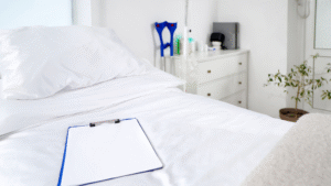 Fresh hospital bed with clean linens and sanitized equipment.