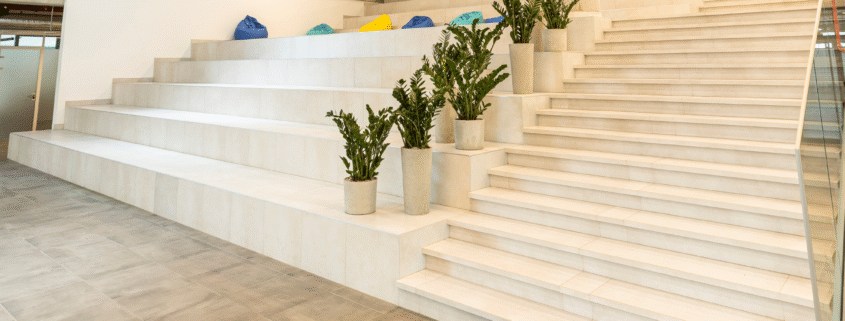 Clean and polished lobby staircase after The Best Post-Construction Cleaning in Chicago.
