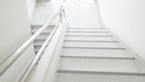 Stairwell polished and cleared after post-construction cleaning.
