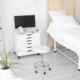 Private exam room with spotless white decor and sanitized equipment