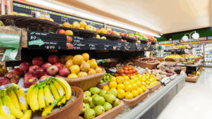 Produce section in a grocery store with colorful, fresh fruits