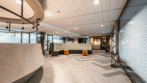 Sleek office reception area with stylish seating and pristine flooring