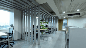 Contemporary office space with natural light and green accents