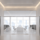 Pristine hallway with elevators and a view into a spotless office
