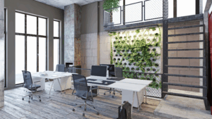 Open office workspace with clean floors, desks, and natural light