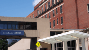 Hospital exterior with clean entrance and medical center signage