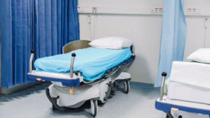Clean hospital recovery bed prepared for patient care by the Best Medical Cleaning Company in Chicago