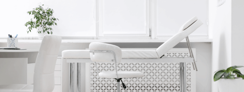 Bright medical room prepared for patient care with professional cleaning