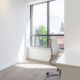 Clean office windows bringing natural light into the workspace