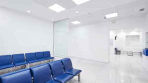 Clean medical waiting area with organized seating and bright lighting