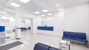 Clean medical waiting area with organized seating and bright lighting