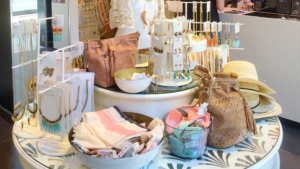 Jewelry and accessory retail display with handbags, scarves, and organized product stands maintained through Chicago's Professional Retail Cleaning.
