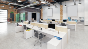Modern open office layout with desks and industrial ceiling design