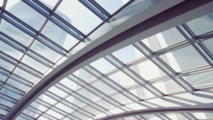 Modern commercial building with reflective glass windows and steel architectural lines