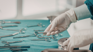 Surgical instruments arranged on sterile table before procedure during Professional Terminal Cleaning in Chicago