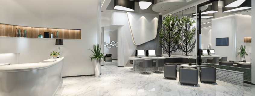 Modern commercial lobby with polished floors and reception desk