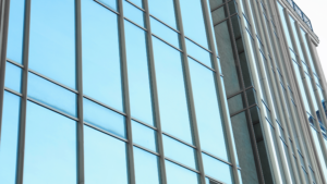 Chicago's Professional Window Cleaning for modern commercial glass buildings with clean reflective windows.
