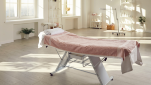 Bright procedure room prepared for patient use with clean treatment table and organized equipment.