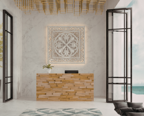 Modern commercial reception area with marble walls, wood reception desk, large windows, and decorative lighting.