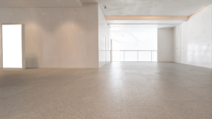 Commercial lobby with finished stone flooring prepared through Post Construction Cleaning in Chicago.