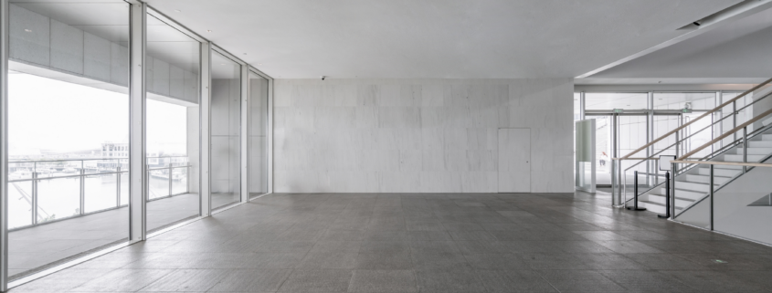 Commercial lobby after Post Construction Cleaning in Chicago with clean floors, glass walls, and ready-to-use common areas.