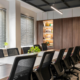 Alt Text: Commercial Office Cleaning Chicago conference room with modern furnishings, clean surfaces, and organized seating.