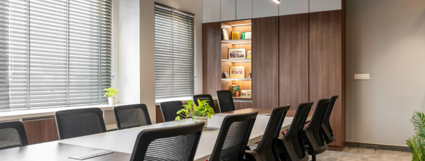 Alt Text: Commercial Office Cleaning Chicago conference room with modern furnishings, clean surfaces, and organized seating.
