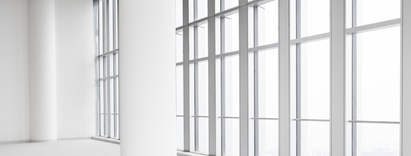 Modern office interior with large clean windows maintained by Commercial Window Cleaning in Chicago.