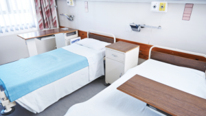 Hospital beds in a clean healthcare treatment area