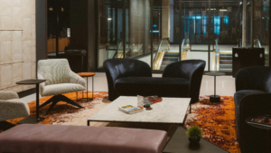 Office lounge with upholstered seating and shared tables